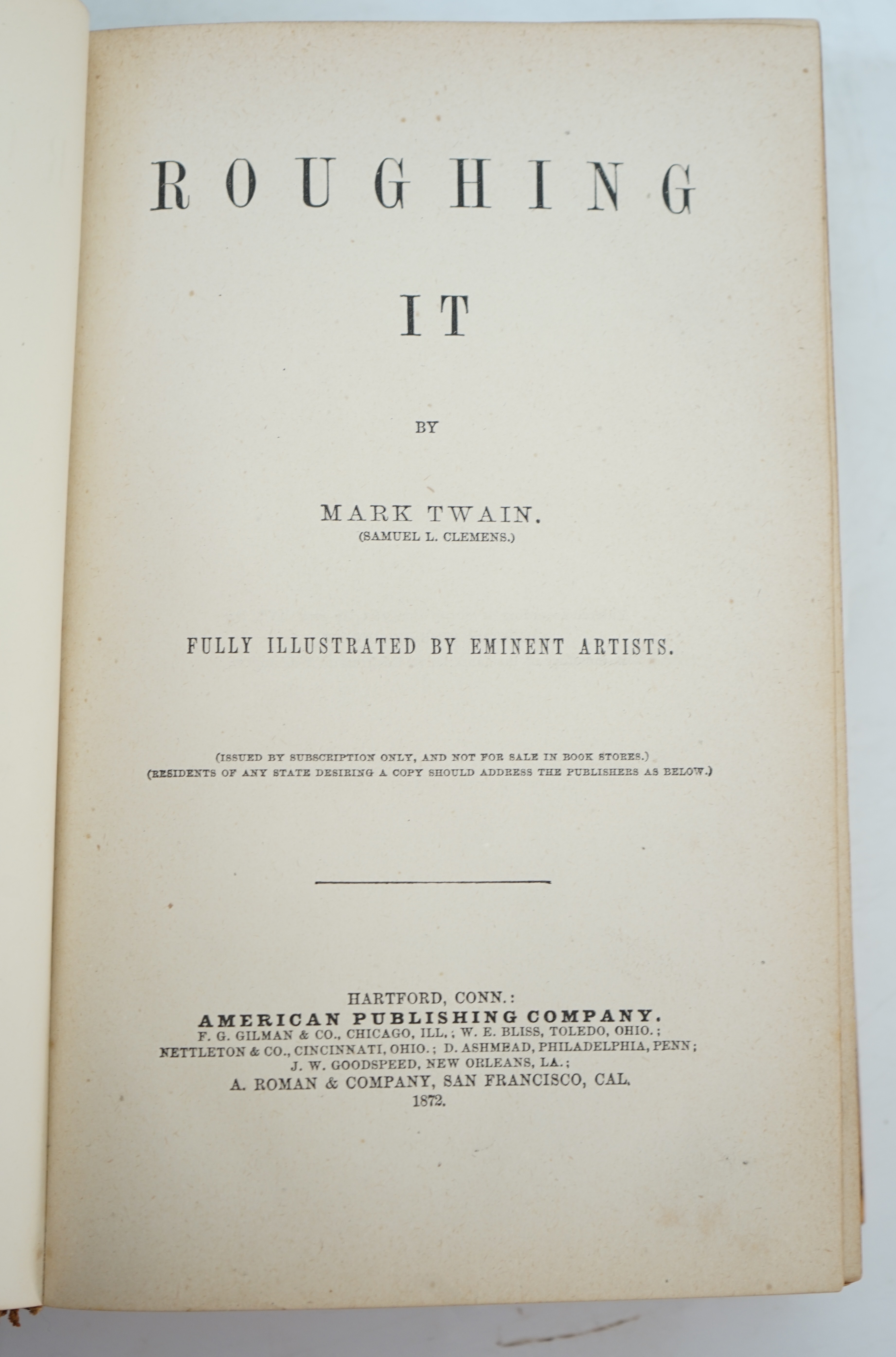 Twain, Mark [Samuel L. Clemens] - Roughing it, 8vo, calf, backstrip torn, boards scuffed, front inner hinge weak, front fly leaf with ink ownership inscription - ‘’John R. Baldwin, Christmas 1872’’, American Publishing C